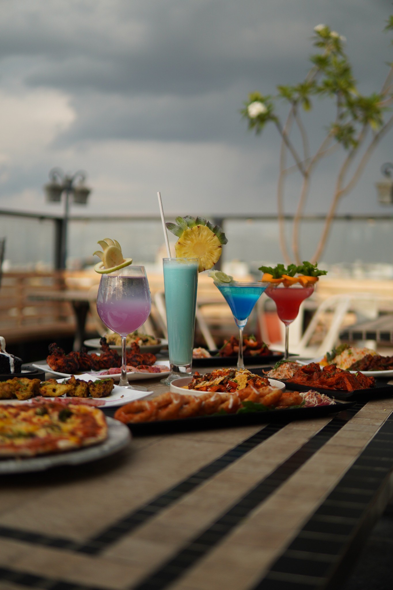 A Sunday rooftop spread of cocktails and shared plates